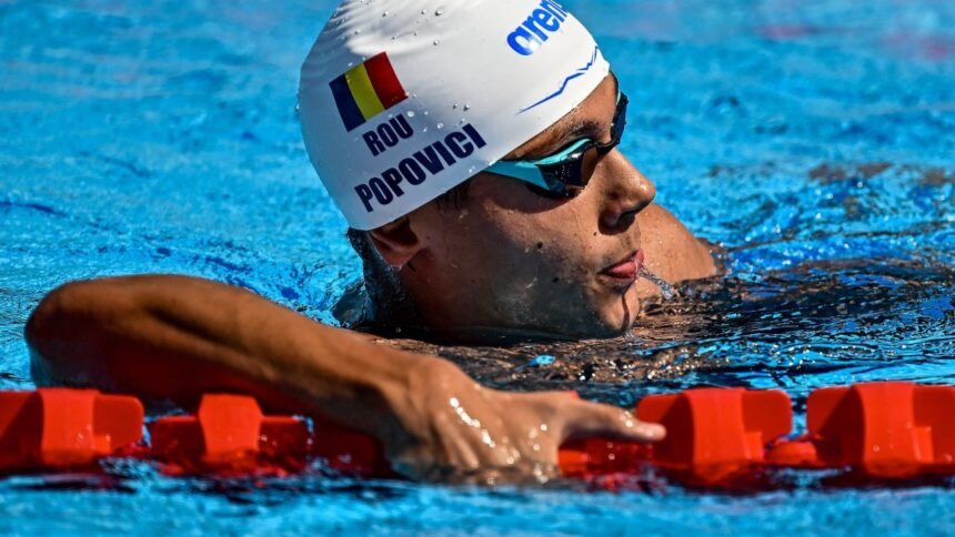 După o nouă distincție, americanii dezvăluie ambiția grandioasă a lui David Popovici în cursa de 100 m liber. 1 dupa o noua medalie americanii dezvaluie obiectivul urias al lui david popovici pentru proba de 100 m liber 685ed2d6106d6