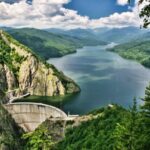 Hidroelectrica dă startul golirii lacului Vidraru pentru prima dată din 1974, pregătindu-se pentru modernizarea hidrocentralei cu o investiție de peste 200 de milioane de euro. 2 video hidroelectrica incepe golirea acumularii vidraru prima dupa 1974 pregatiri pentru retehnologizarea hidrocentralei investitie de peste 200 de milioane de euro 688b6a07db302