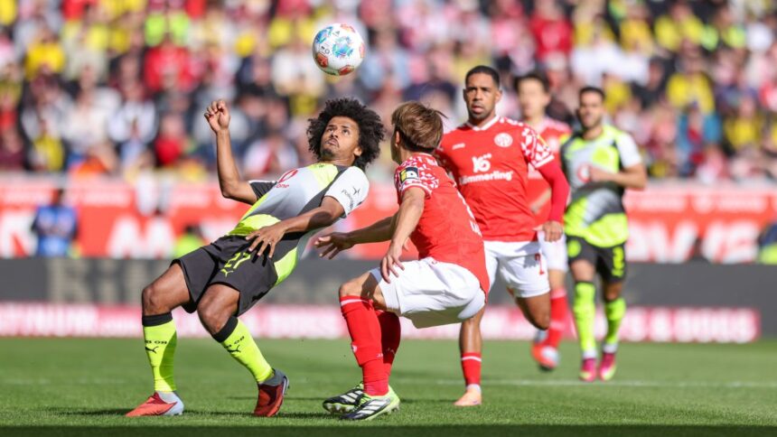 Un talent neexplorat: Ce jucător de excepție ar fi putut să îmbrace tricoul naționalei României! 3 reușite și 2 pase decisive în ultimele 4 partide cu Borussia Dortmund 1 video ce fotbalist putea avea nationala romaniei 3 goluri si 2 pase de gol in ultimele 4 meciuri la borussia dortmund 68d8157d86646